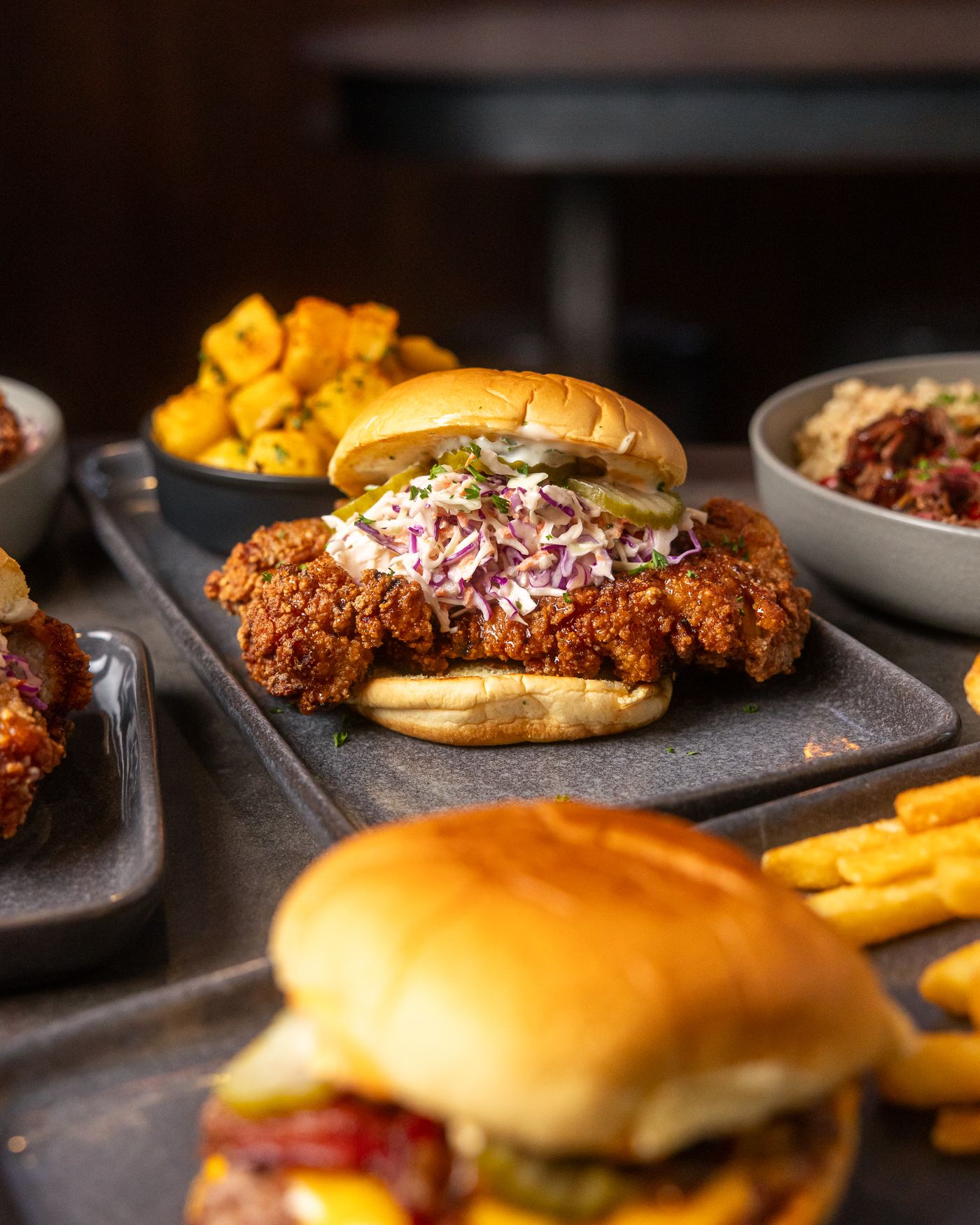 Crispy fried chicken burger with slaw and pickles